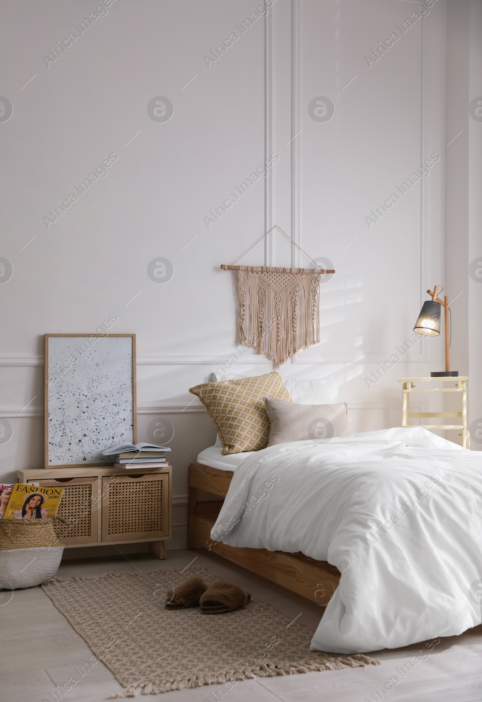 Photo of Comfortable bed with clean white linens indoors