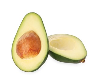 Photo of Fresh tasty avocado halves isolated on white