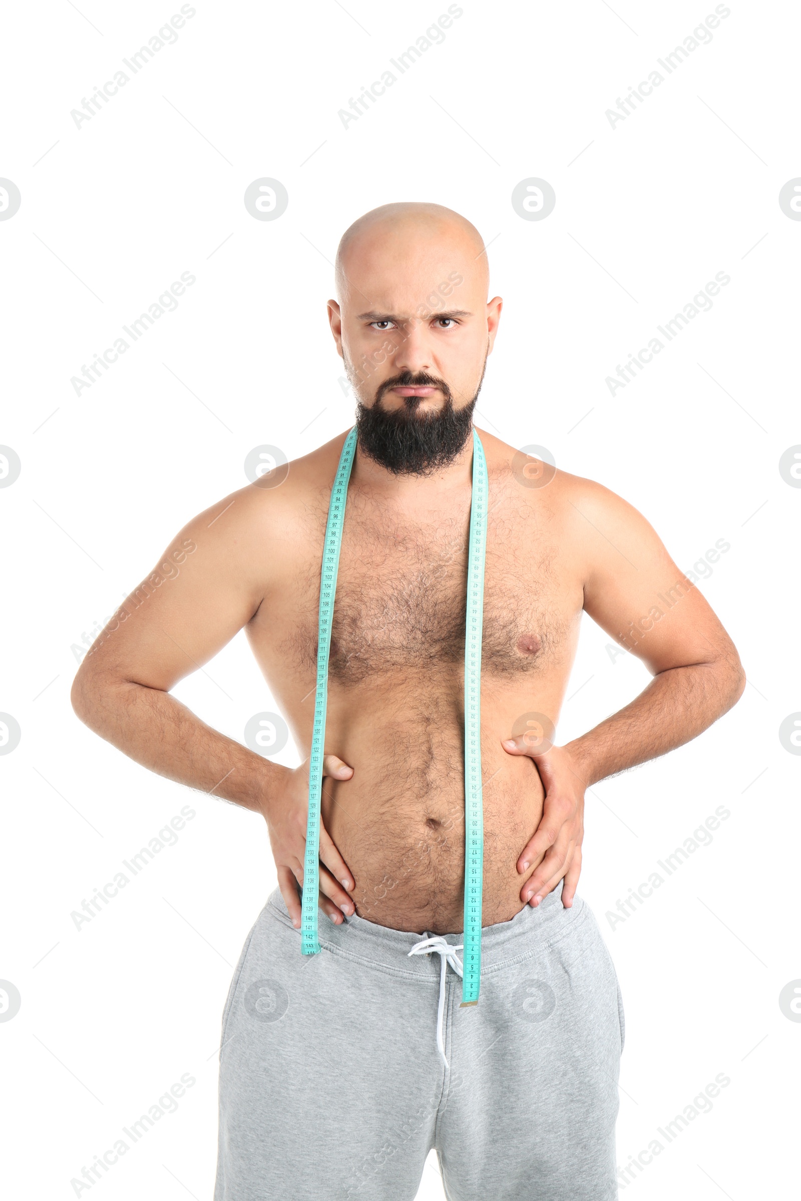 Photo of Overweight man with measuring tape on white background