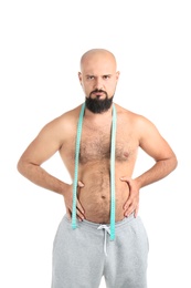 Photo of Overweight man with measuring tape on white background