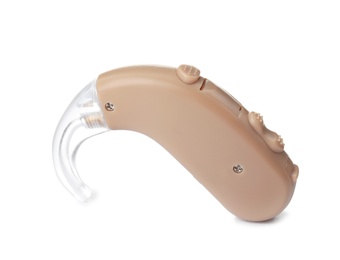 Photo of Hearing aid on white background. Medical device