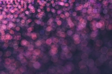 Photo of Magic pink bokeh effect on dark background