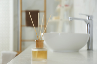 Photo of Reed air freshener on counter in bathroom