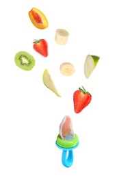 Image of Nibbler and different fruits falling on white background. Baby feeder