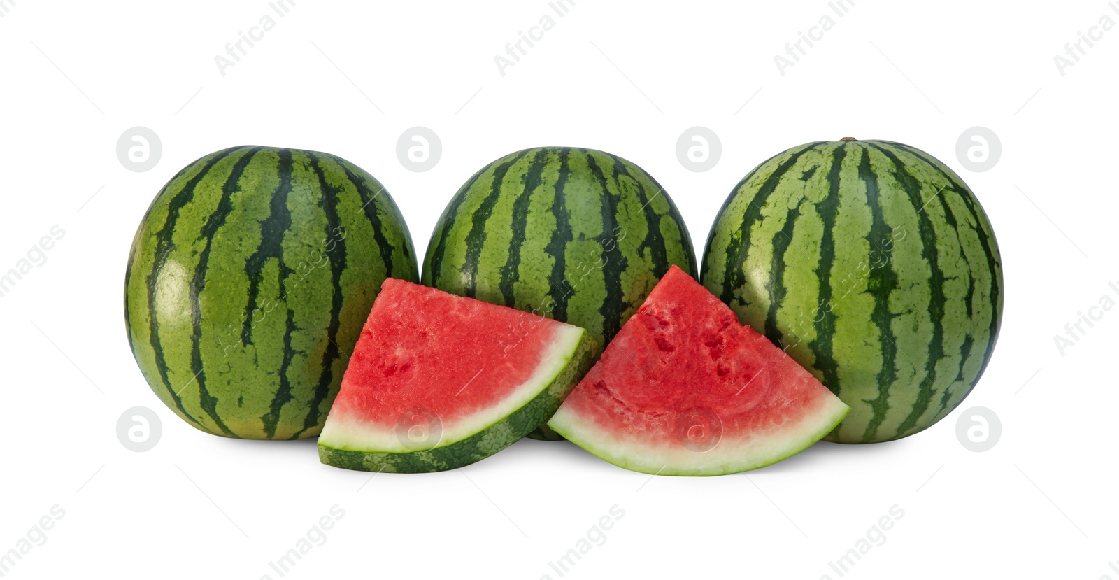 Photo of Delicious cut and whole ripe watermelons isolated on white