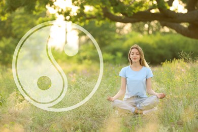 Young woman meditating on green grass in park. Yin and yang symbol