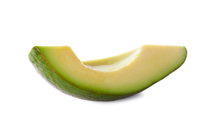 Slice of ripe avocado isolated on white