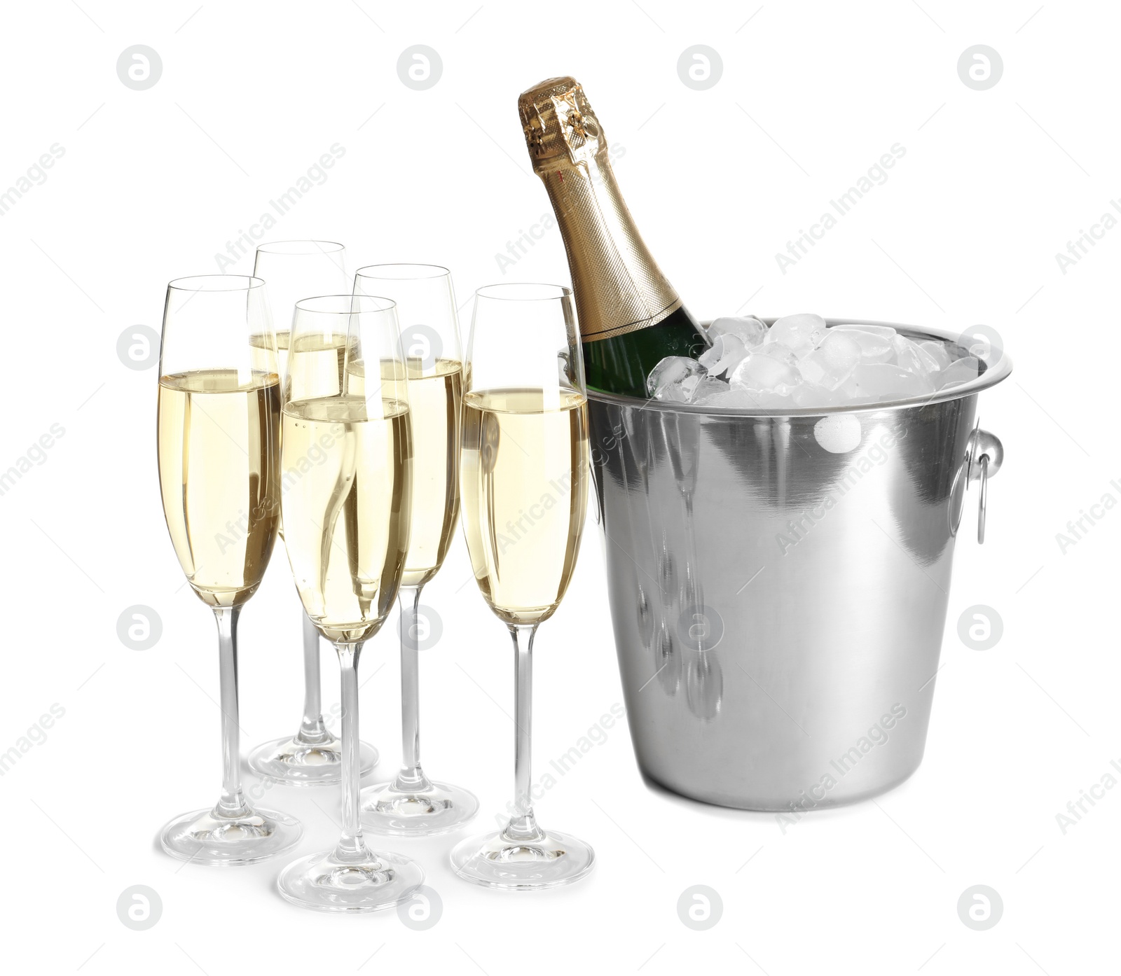 Photo of Glasses with champagne and bottle in bucket on white background