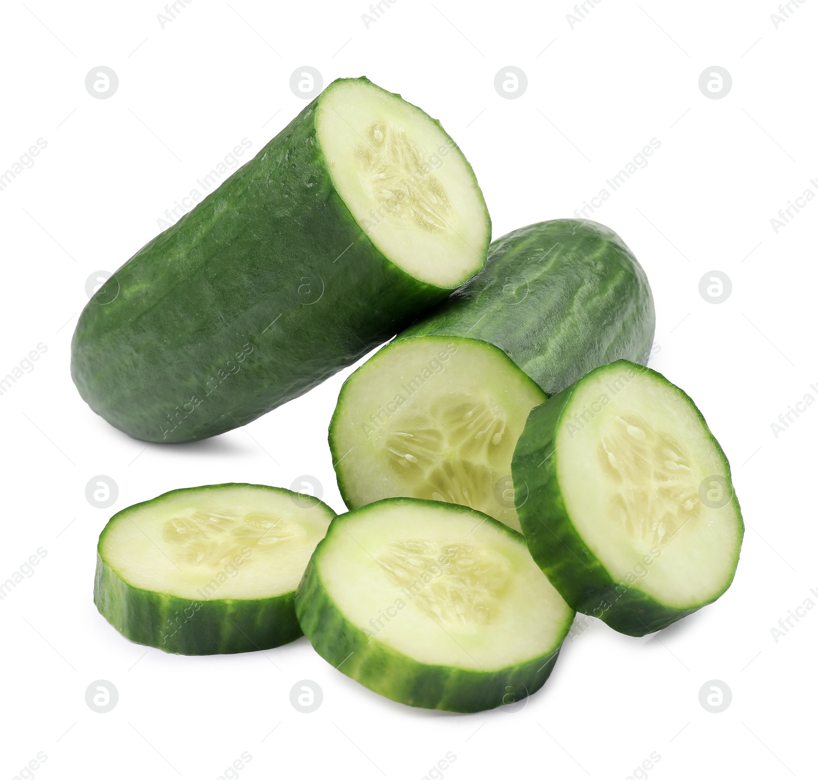 Photo of Halves and slices of long cucumber isolated on white