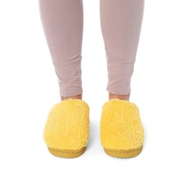 Photo of Woman in yellow soft slippers on white background, closeup