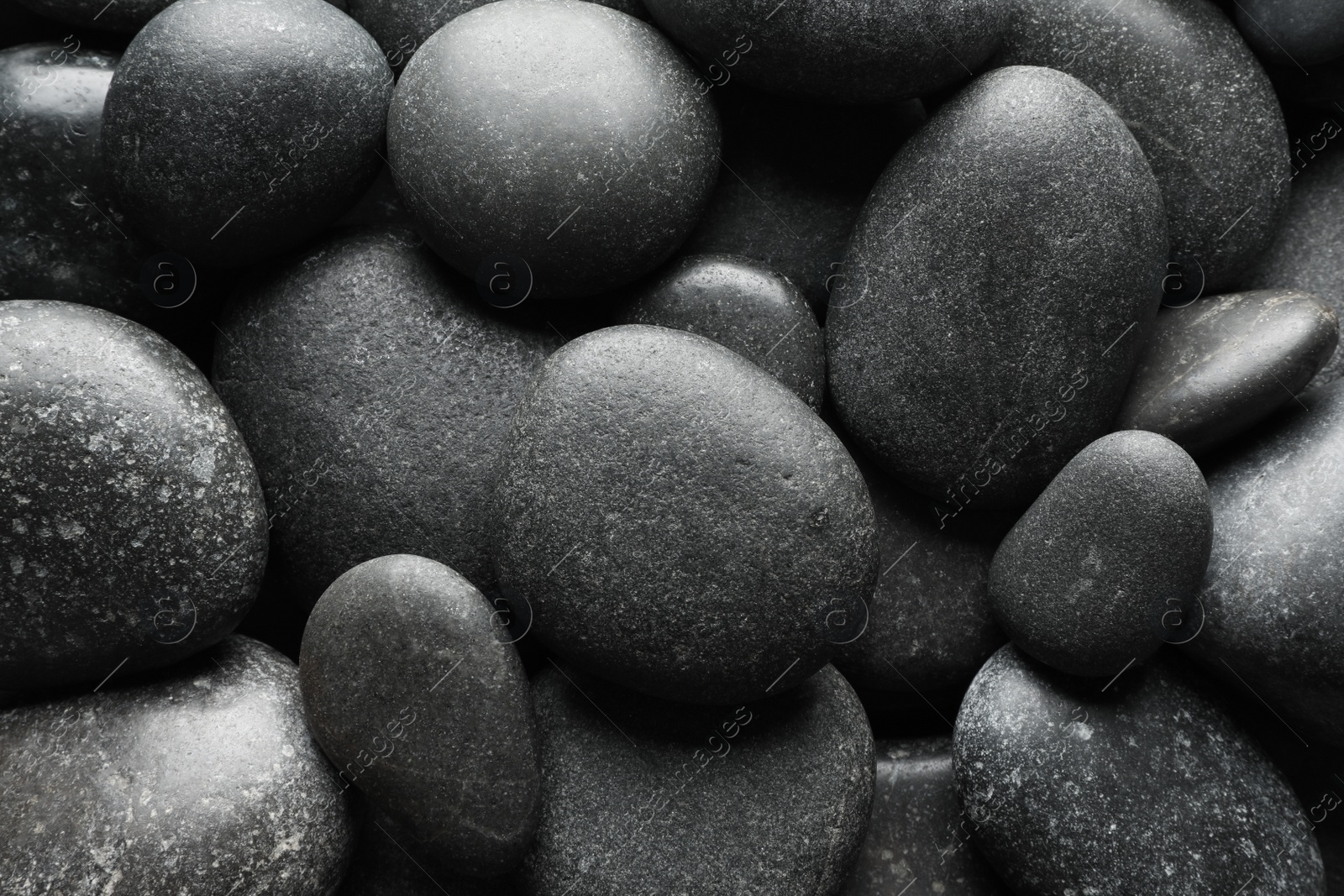 Photo of Many different stones as background, top view