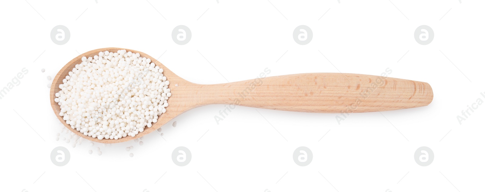 Photo of Spoon with tapioca pearls isolated on white, top view