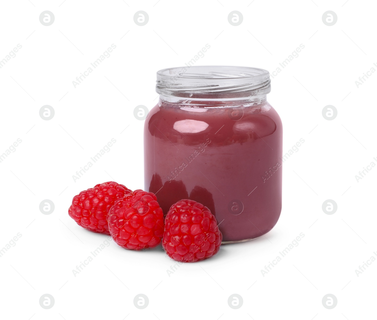 Photo of Jar of healthy baby food and fresh raspberries on white background