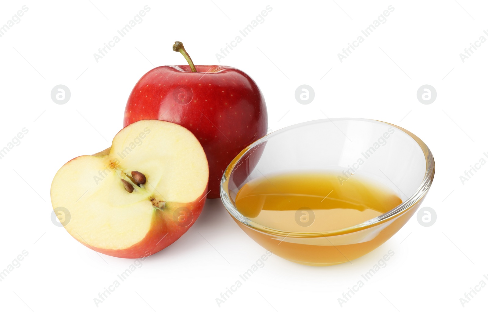 Photo of Delicious apples and bowl of honey isolated on white