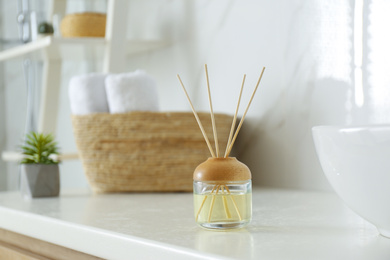 Photo of Reed air freshener on counter in bathroom