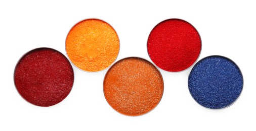 Many different food coloring on white background, top view