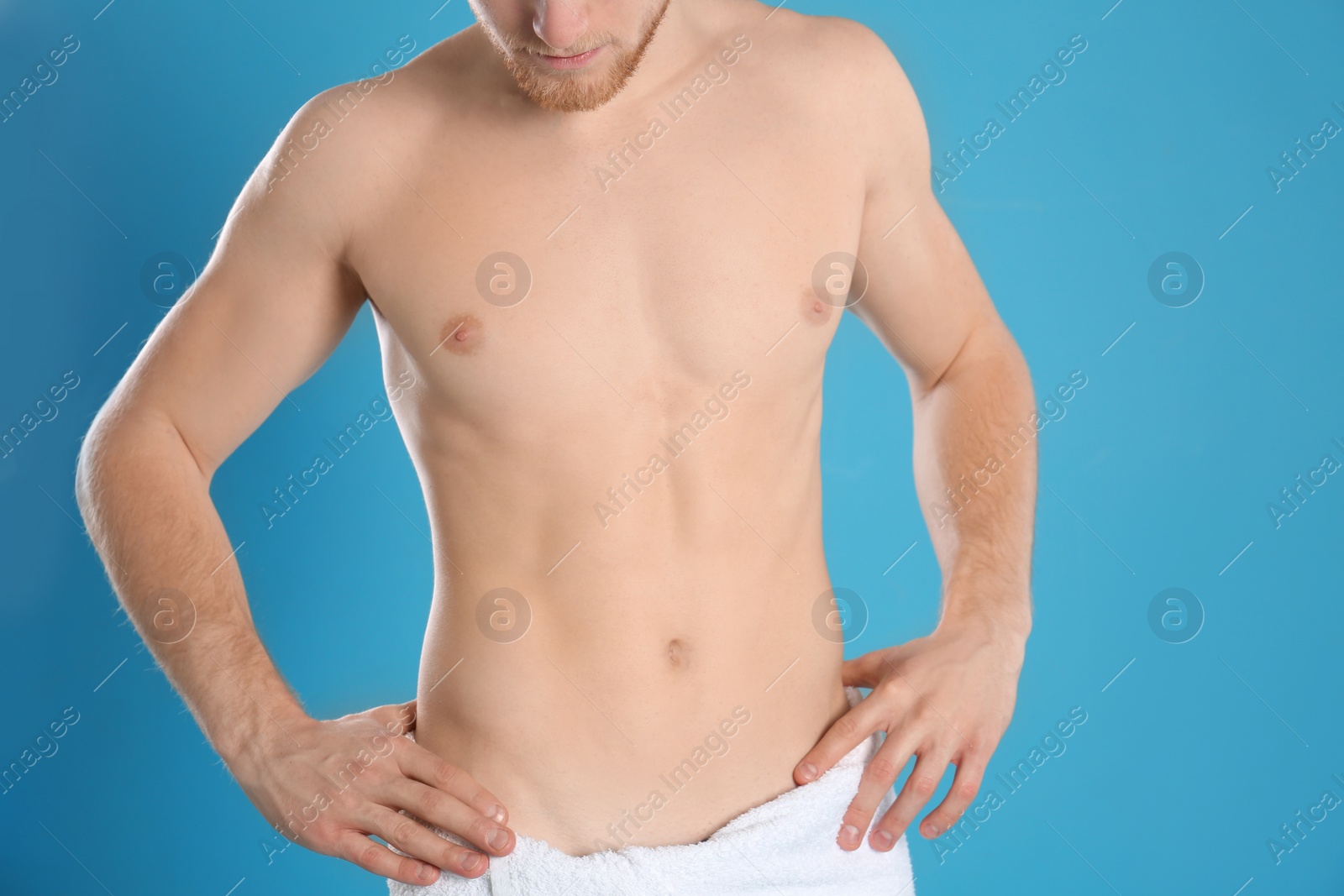 Photo of Man with slim body on color background, closeup