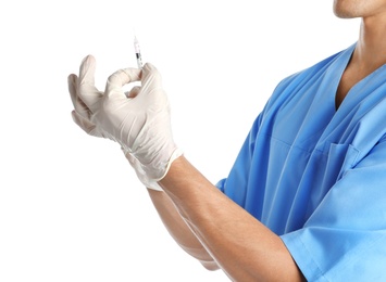 Male doctor with insulin syringe on white background, closeup. Medical object