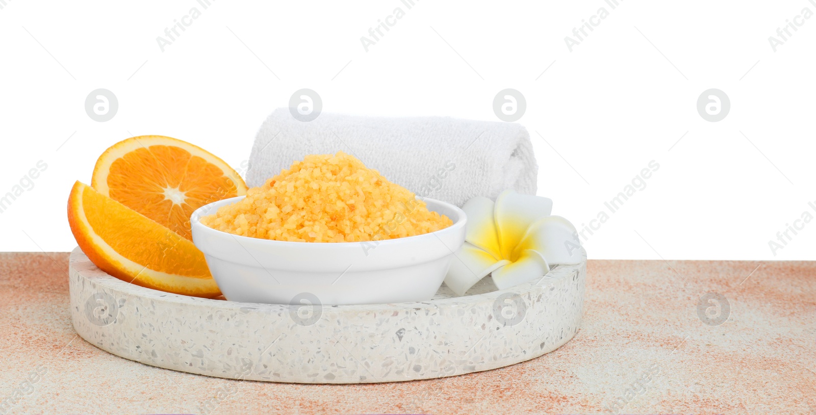 Photo of Composition with sea salt and towel on beige textured table against white background
