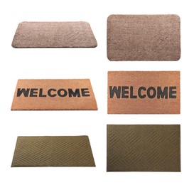 Image of Set with different door mats on white background