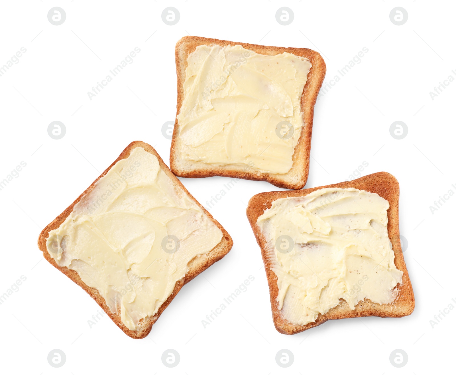 Photo of Tasty toasts with butter on white background, top view