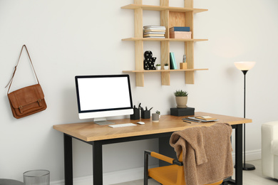 Photo of Stylish room interior with modern comfortable workplace