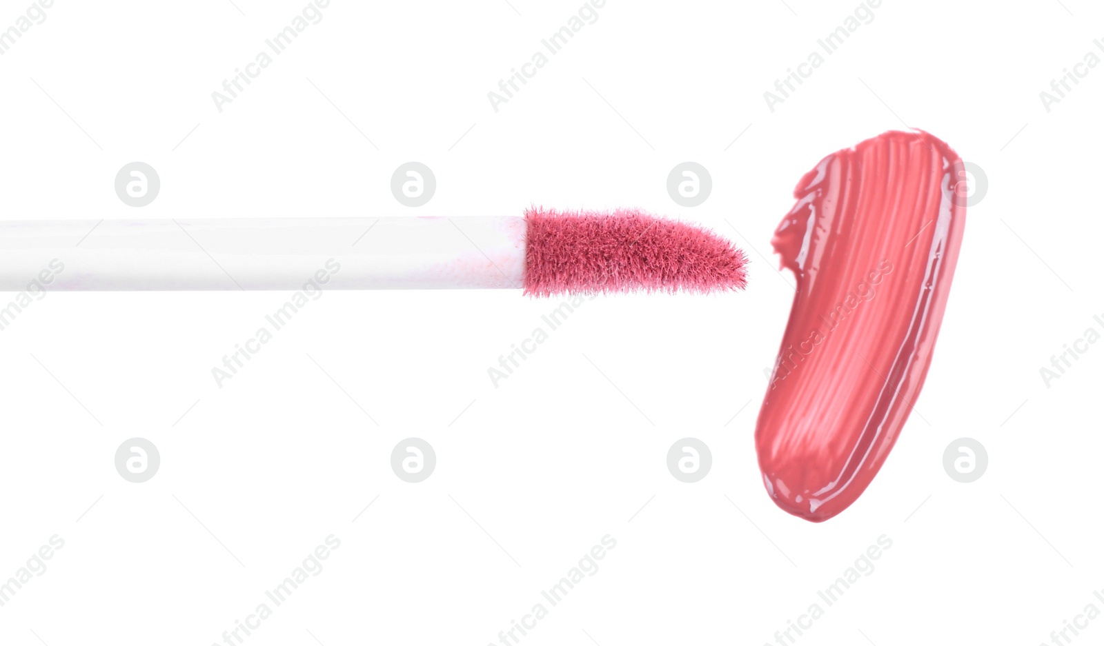 Photo of Stroke of pink lip gloss and applicator isolated on white, top view