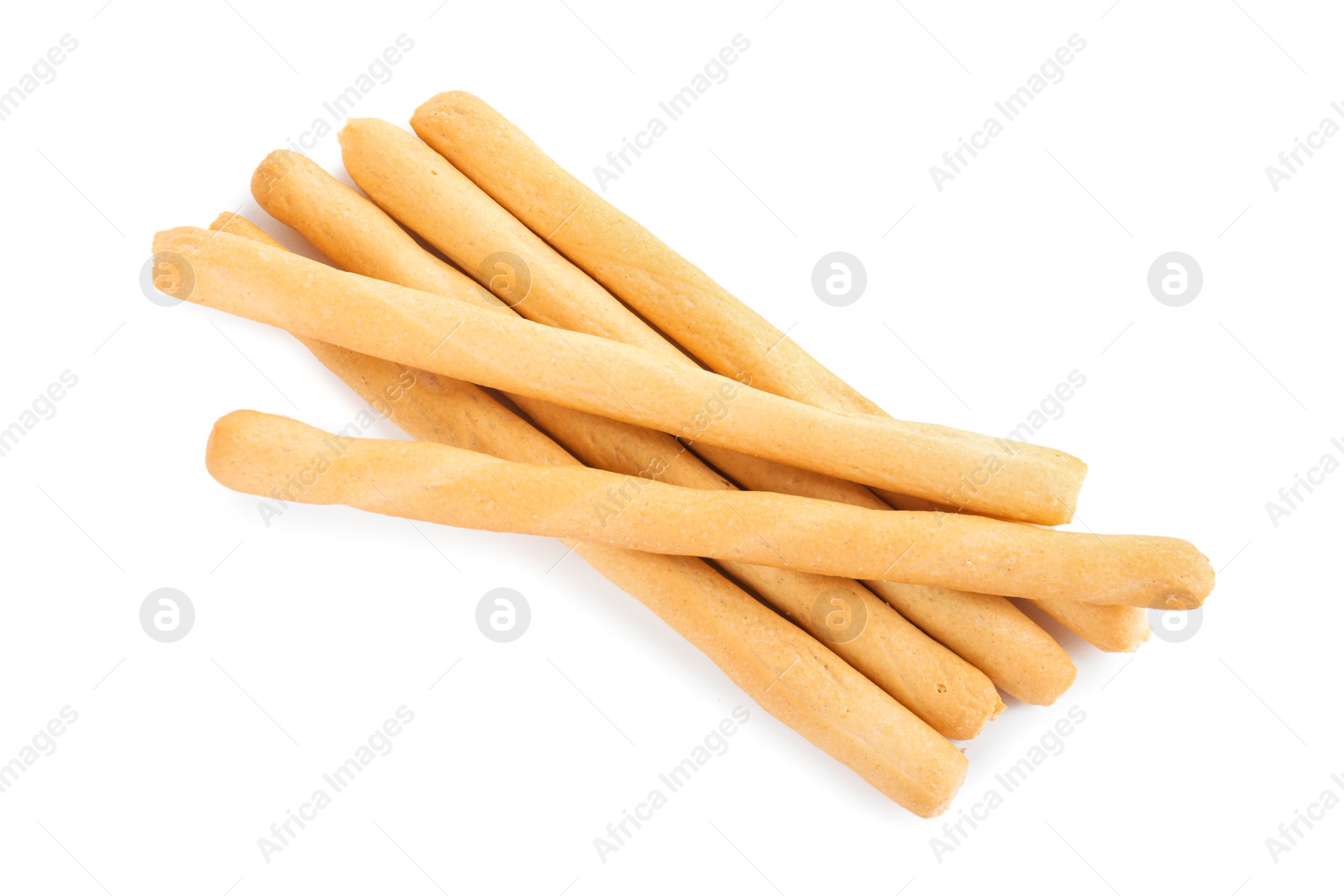 Photo of Fresh delicious grissini sticks on white background, top view