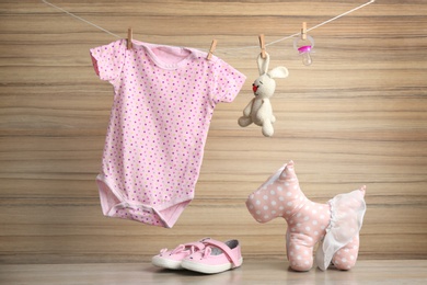 Composition with baby accessories on wooden background