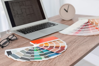Photo of Color palette on table in designer's office