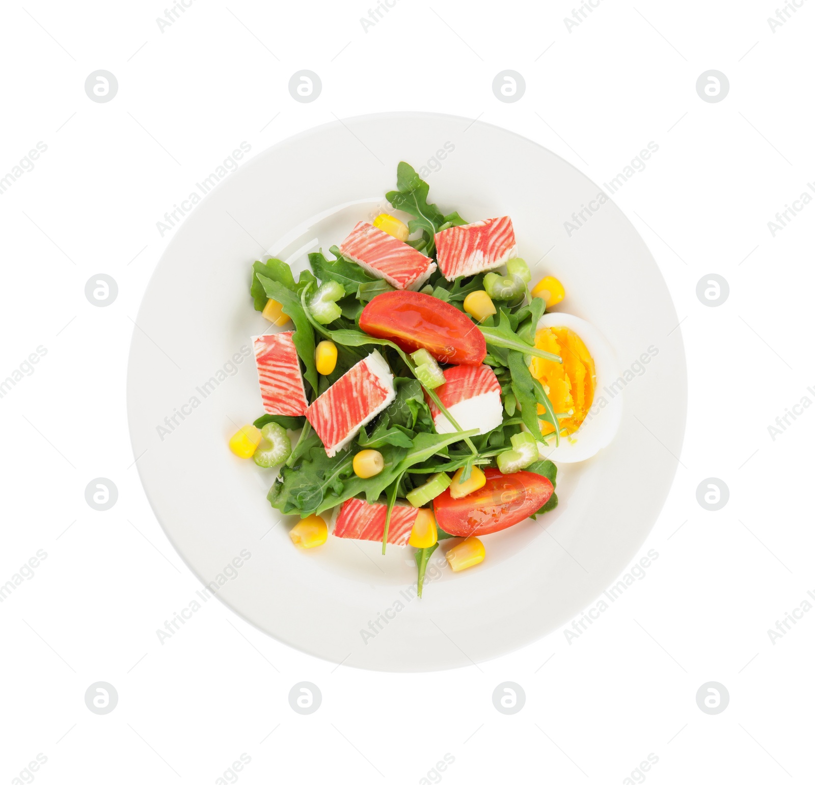 Photo of Plate with delicious crab stick salad isolated on white, top view