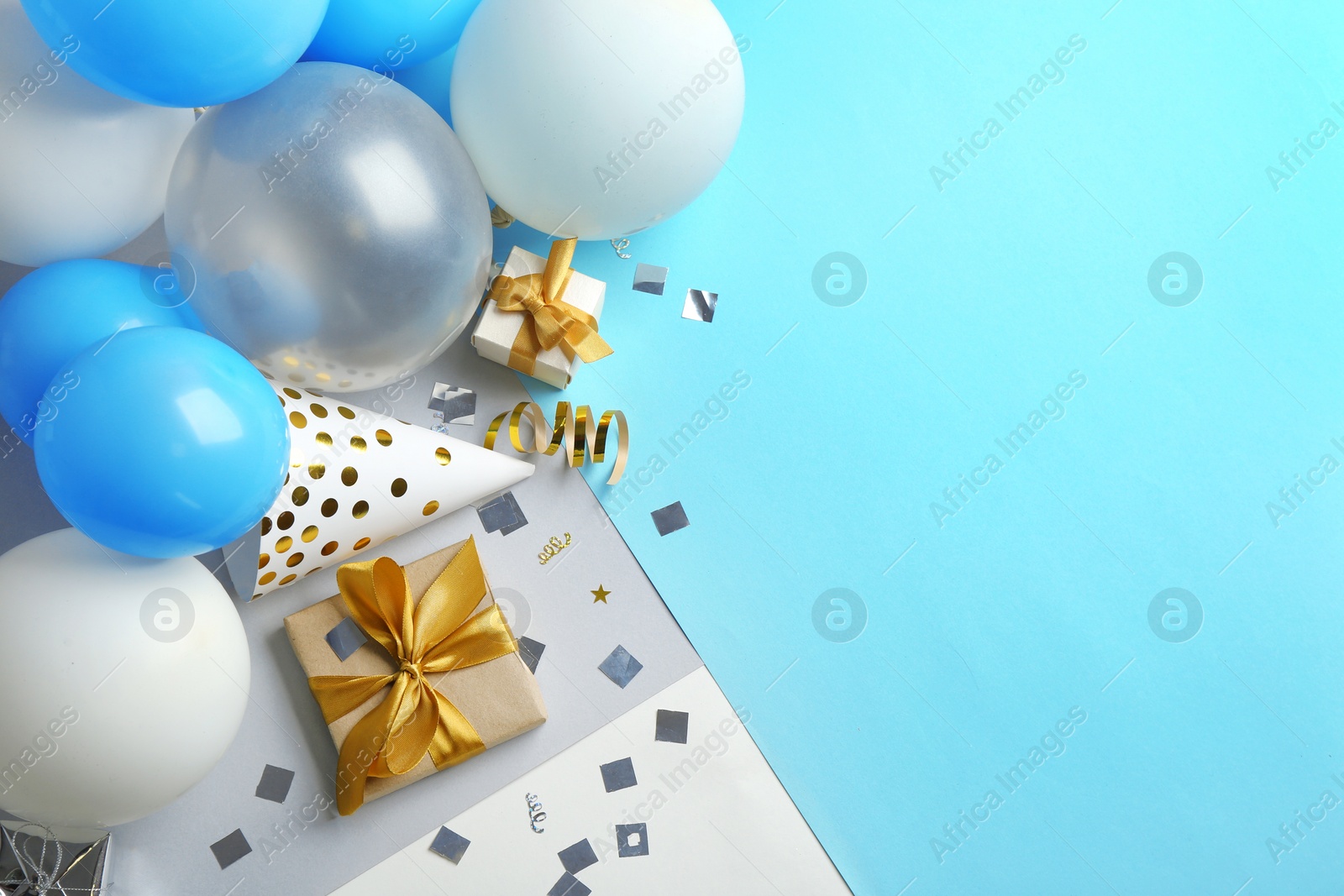 Photo of Flat lay composition with party accessories and space for text on color background