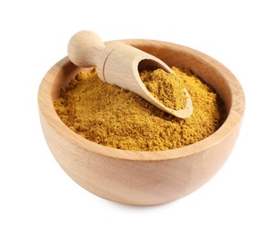 Photo of Dry curry powder in bowl and scoop isolated on white