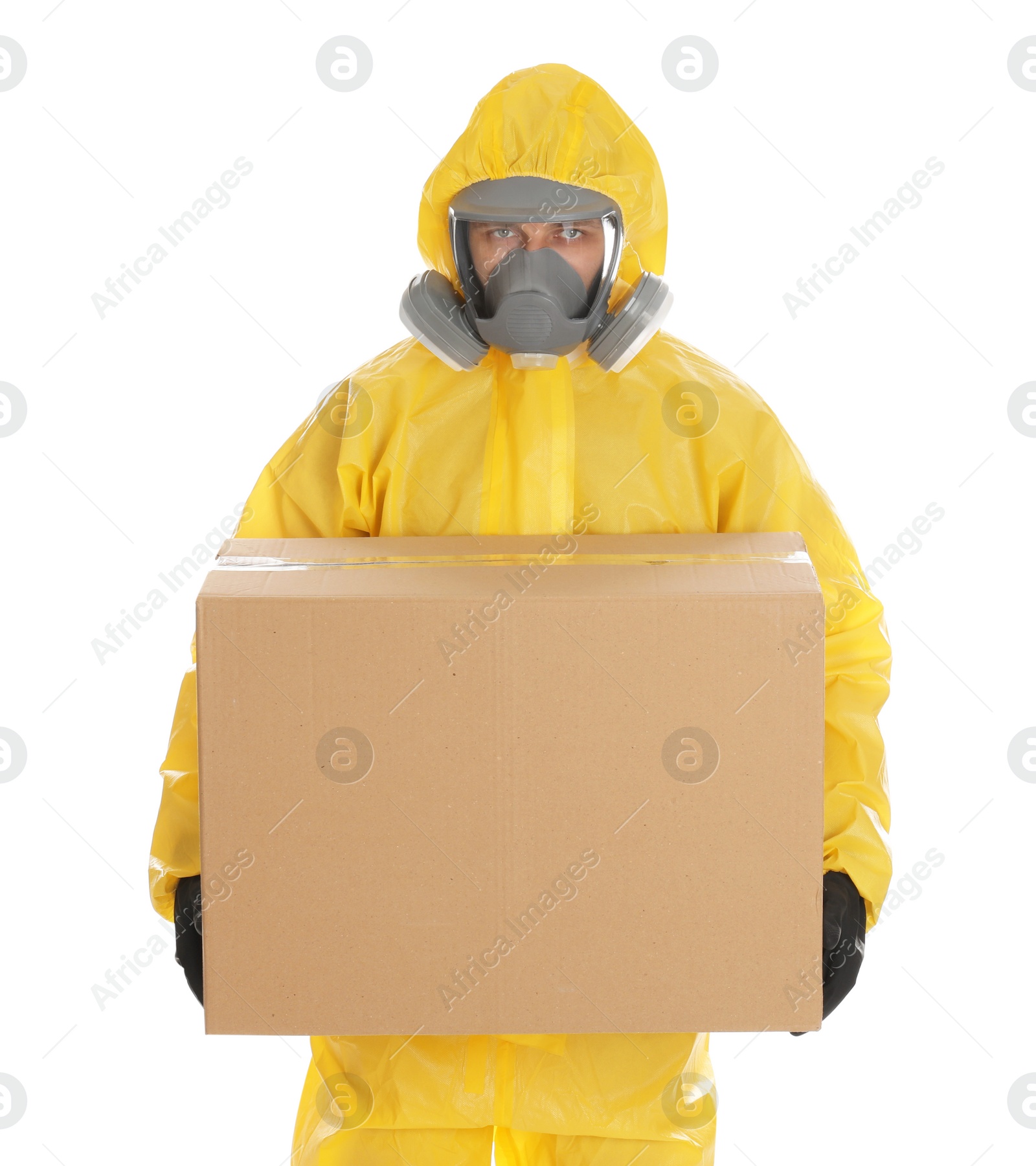 Photo of Man wearing chemical protective suit with cardboard box on white background. Prevention of virus spread