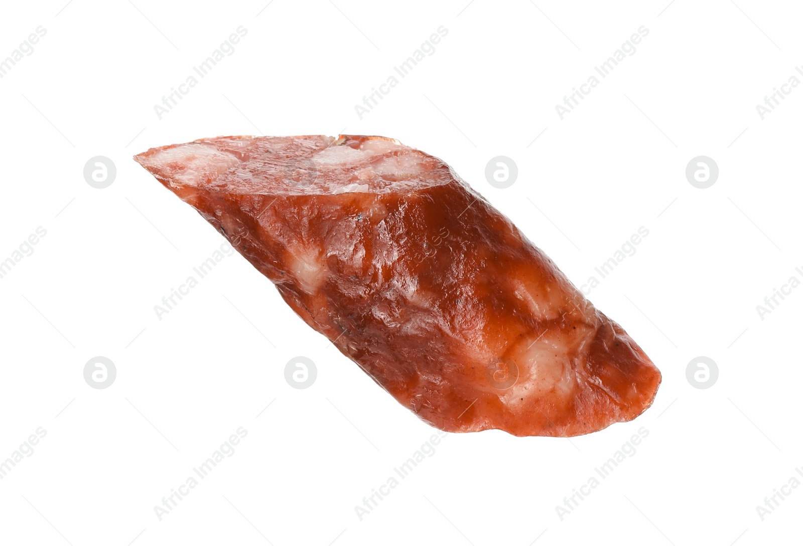 Photo of Piece of thin dry smoked sausage isolated on white