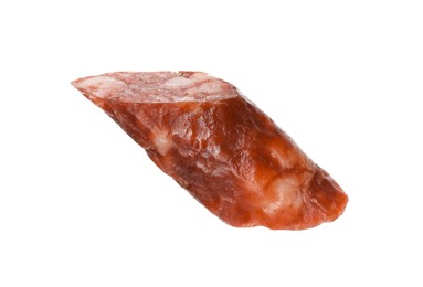 Photo of Piece of thin dry smoked sausage isolated on white