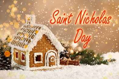 Saint Nicholas Day. Beautiful gingerbread house decorated with icing on snow