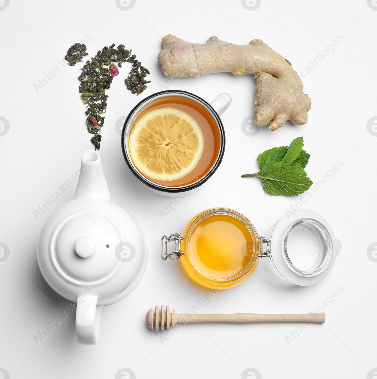 Photo of Composition with lemon tea, honey and ginger on white background, top view