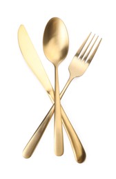 Photo of Shiny golden fork, spoon and knife isolated on white. Luxury cutlery