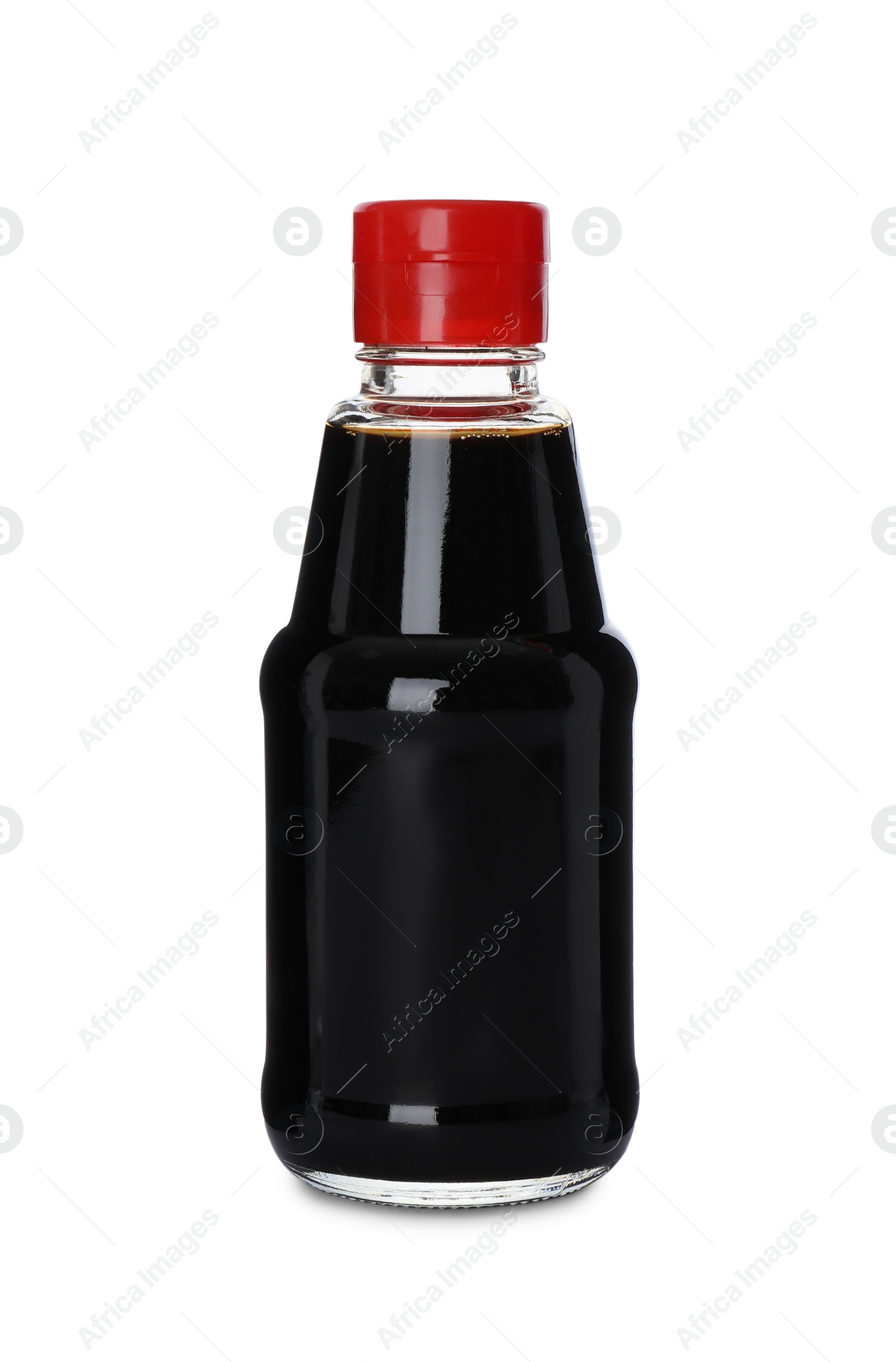 Photo of Bottle of tasty soy sauce isolated on white