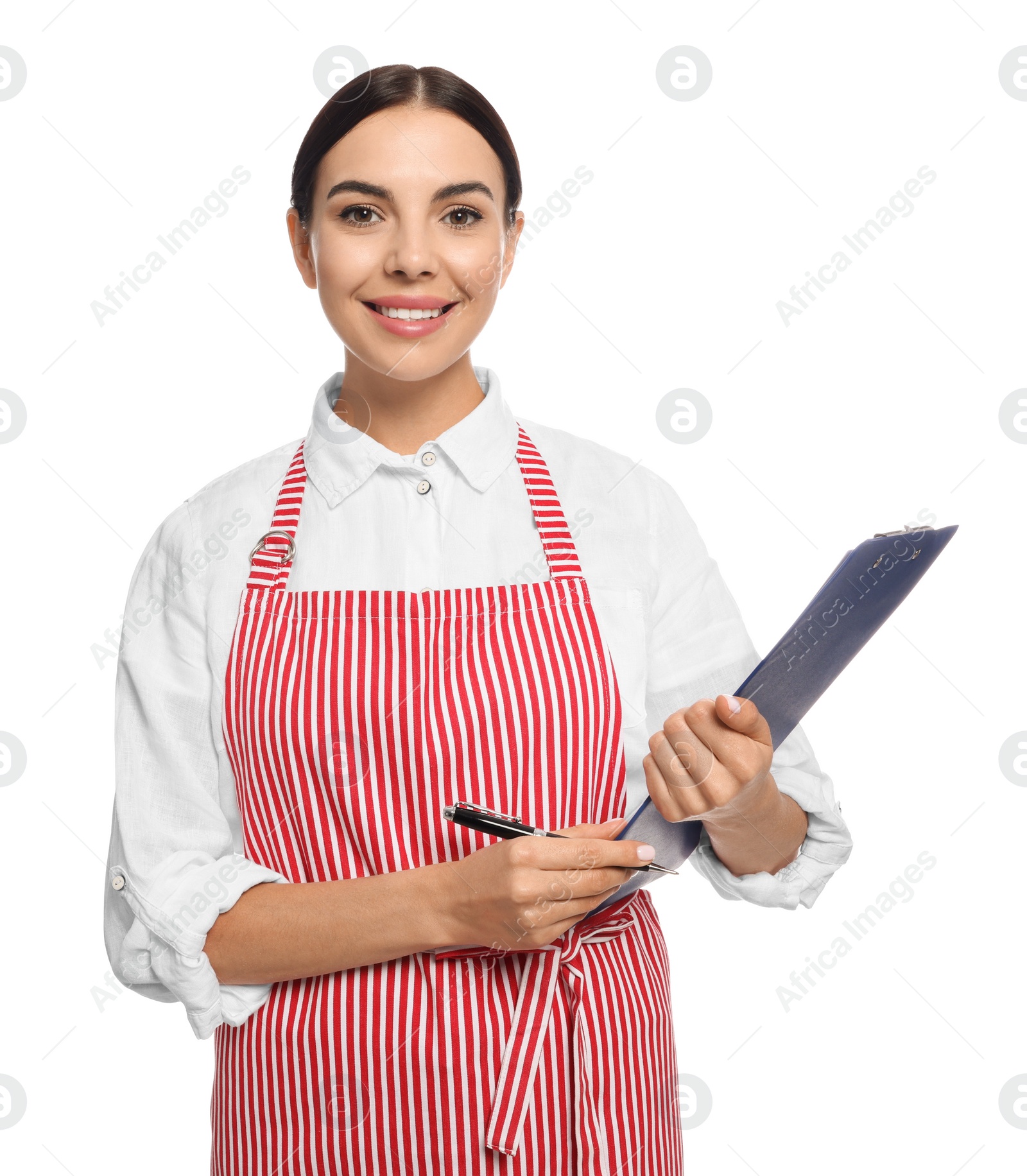 Photo of Young woman in red striped apron with clipboard on white background