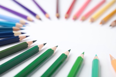 Photo of Composition with color pencils on white background