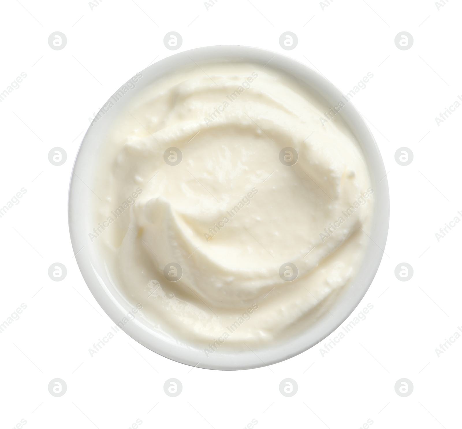 Photo of Bowl of tasty cream cheese on white background, top view