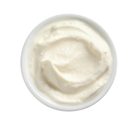 Photo of Bowl of tasty cream cheese on white background, top view