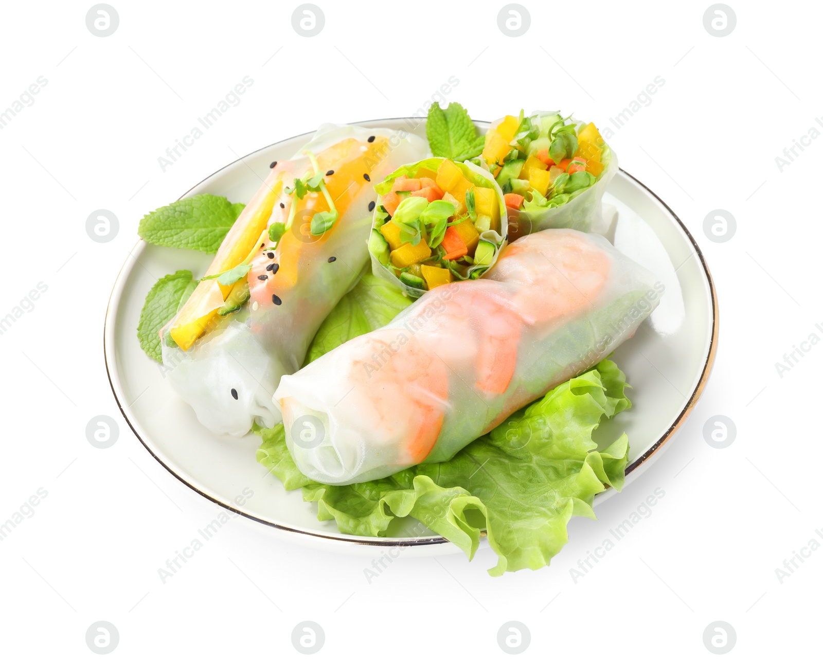 Photo of Plate with tasty spring rolls isolated on white