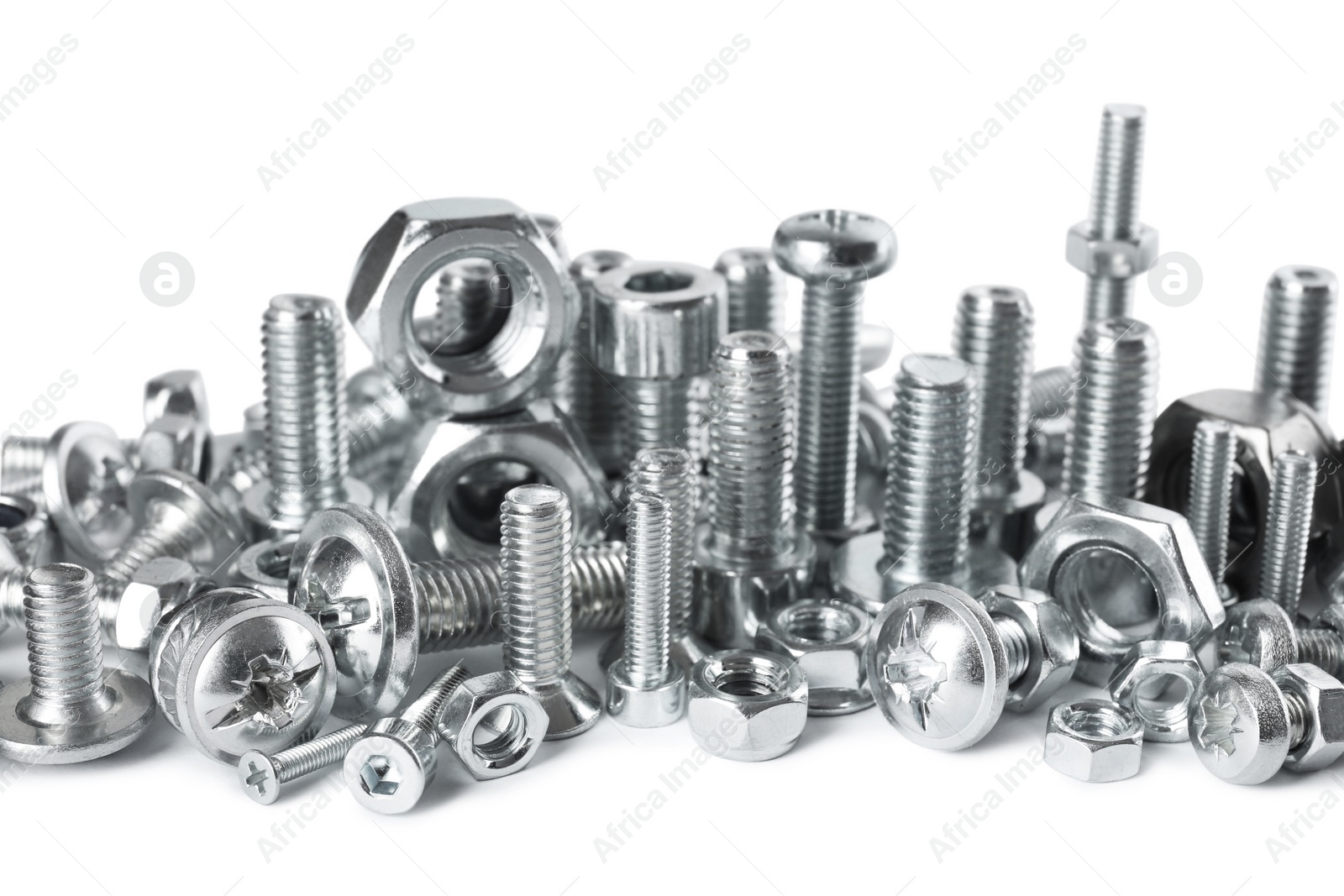 Photo of Different metal bolts and nuts on white background