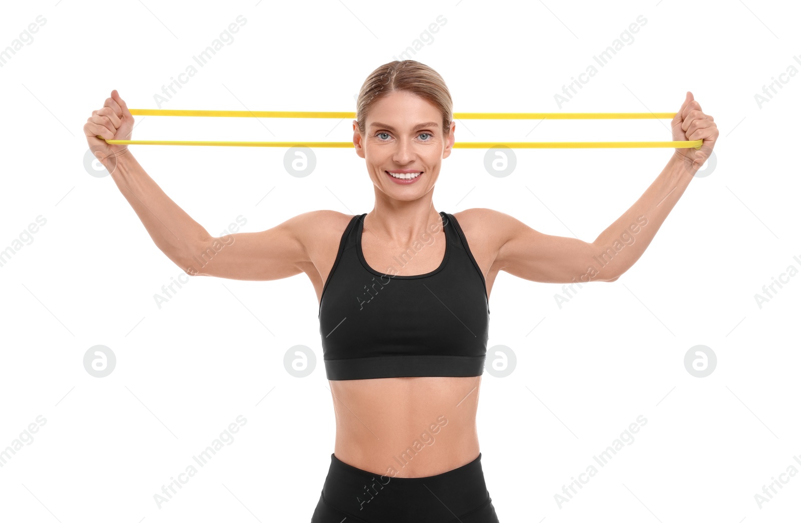 Photo of Woman exercising with elastic resistance band on white background