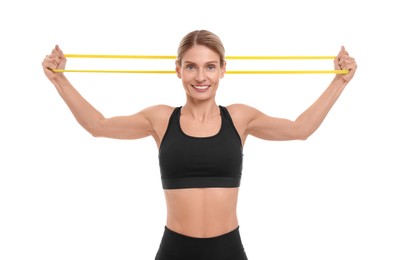 Woman exercising with elastic resistance band on white background