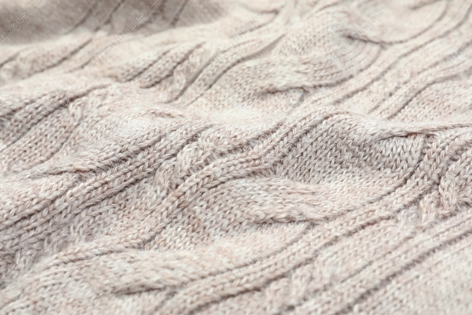 Photo of Texture of cozy warm sweater as background, closeup