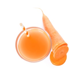 Photo of Glass of freshly made carrot juice on white background, top view